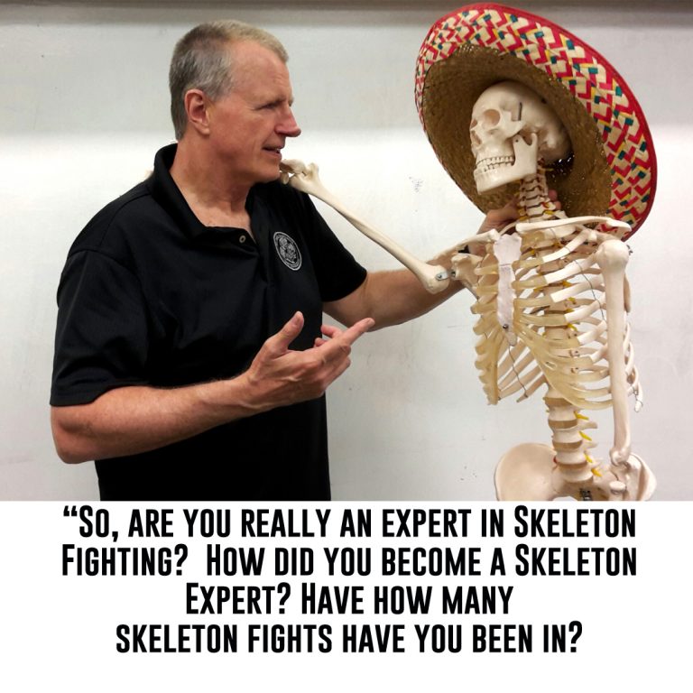 Hock having a conversation with a skeleton who is wearing a sombrero