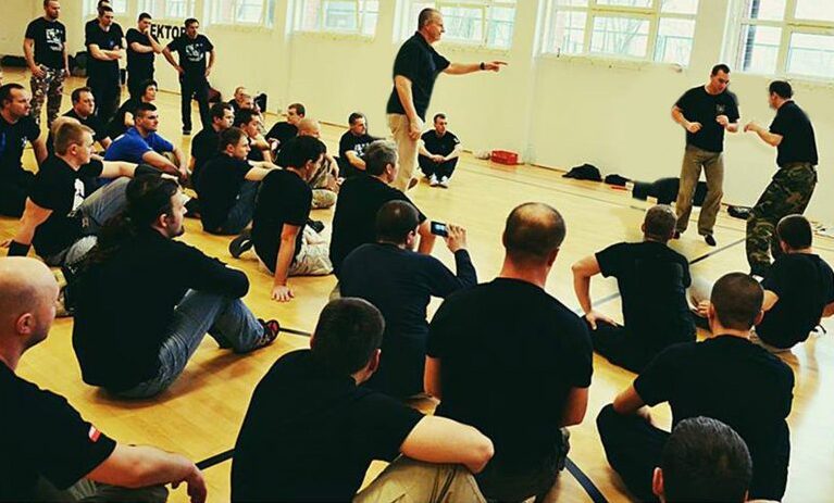 Hock Hochheim training and lecturing in front of an international group.