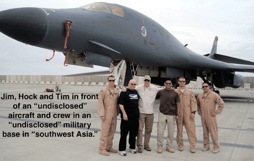Hock pictured somewhere in the Middle- East in front of a military aircraft.